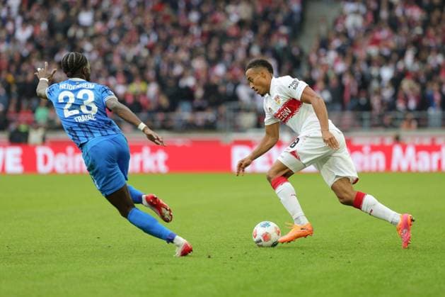 Stuttgart , Bundesliga Soccer VfB Stuttgart vs 1 FC Heidenheim, f l Omar Haktab Traore Heidenheim Jamie Leweling VfB According to the regulations of the DFL German Soccer League, it is prohibited to use or have used photographs taken in the stadium and or of the match in the form of sequential images and or video-like photo series