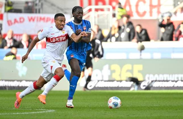duel, action Jamie Leweling VfB Stuttgart 18 vs Omar Haktab Traore 1 FC Heidenheim 1846 FCH 23 VfB Stuttgart vs 1 FC Heidenheim FCH 05 10 2025 DFL REGULATIONS PROHIBIT ANY USE OF PHOTOGRAPHS AS IMAGE SEQUENCES AND OR QUASI VIDEO VfB Stuttgart vs 1 FC Heidenheim FCH
