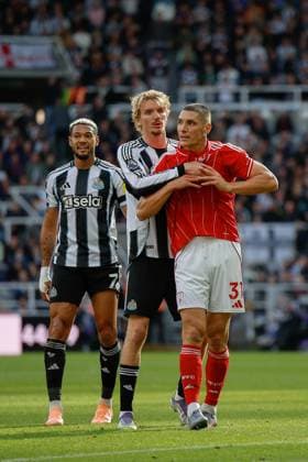 5th October 2025; St James Park, Newcastle, England; Premier League Football, Newcastle United versus Nottingham Forest; Nick Woltemade of Newcastle United holds onto Nikola Milenkovic of Nottingham Forest  CraigxCowan