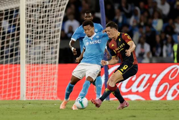 Serie a football match SSC Napoli vs Genoa Napoli s Brazilian forward David Neres challenges for the ball with Genoa s Portuguese forward Vitinha during the Serie A football match between SSC Napoli and Genoa Cricket and Football Club at the Diego Armando Maradona Stadium in Naples, October 05, 2025. _BPH9807 Copyright: xAntonioxBalascox