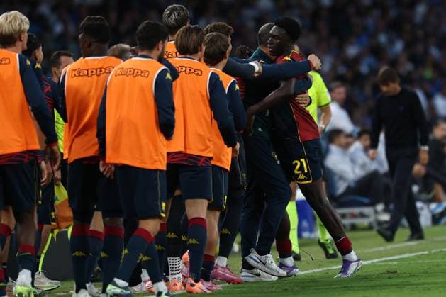 Jeff Ekhator of Genoa CFC celebrates with team mates after scoring the goal of 0-1 during the Serie A 2025 2026 football match between SSC Napoli and Genoa CFC at Diego Armando Maradona stadium in Naples (Italy), October 05th, 2025. CesarexPurini