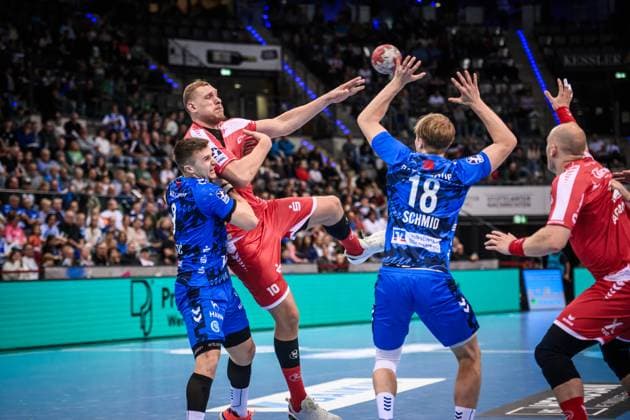 Dainis Kristopans MT Melsungen, 10 between Nico Schoettle TVB Stuttgart, 08 and Linus Schmid TVB Stuttgart, 18 GER, TVB 1898 Stuttgart MT Melsungen, DAIKIN HBL, Handball, Bundesliga, Matchday 7, Season 2025 2026, 05 10 2025 GER, TVB 1898 Stuttgart Frisch Auf Goeppingen, DAIKIN HBL, Handball, Bundesliga, Matchday 7, Season 2025 2026, 05 10 2025 Stuttgart Copyright: xSandyxDinkelackerx EP_SDR