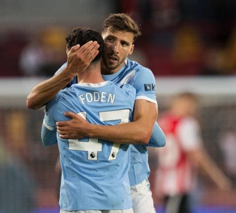 Brentford v Manchester City Premier League Ruben Dias and Phil Foden of Manchester City celebrate victory over Brentford in the Premier League match at the Gtech Community Stadium, Brentford UK Newspapers OUT Copyright: xGraemexWilcocksonx FIL-22323-0119