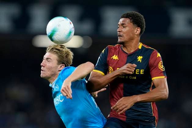 Rasmus Hojlund (SSC Napoli) and Sebastian Otoa (Genoa CFC) battle for the ball, Serie A, SSC Napoli v Genoa CFC, Diego Maradona, October 5, 2025, Napoli, Italy.