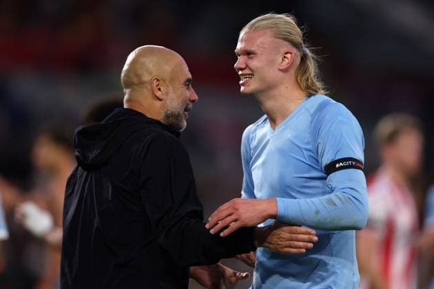 London, England, 5th October 2025. Erling Haaland of Manchester City and Josep Guardiola, Manager of Manchester City after the Brentford vs Manchester City Premier League match at Gtech Community Stadium, London. Picture credit should read: Paul Terry Sportimage EDITORIAL USE ONLY. No use with unauthorised audio, video, data, fixture lists, club league logos or live services. Online in-match use limited to 120 images, no video emulation. No use in betting, games or single club league player publications. SPI_038_PT_Brentford_Man_City SPI-4202-0038