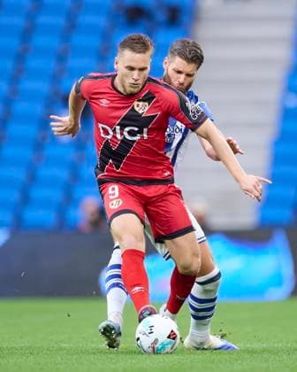 October 5, 2025, San Sebastian, Guipuzcoa, SPAIN: Alexandre Zurawski Alemao of Rayo Vallecano competes for the ball with Duje Caleta-Car of Real Sociedad during the LaLiga EA Sports match between Real Sociedad and Rayo Vallecano at Anoeta on October 5, 2025, in San Sebastian, Spain. San Sebastian SPAIN - ZUMAa181 20251005_zaa_a181_175 Copyright: xRicardoxLarreinax