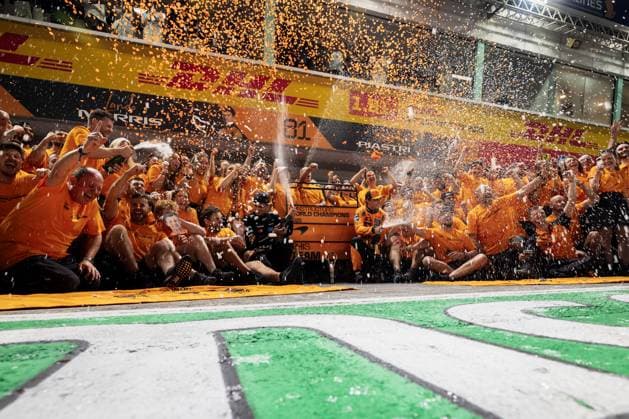 Marina Bay Street Circuit, Singapore, Singapore. 5.October.2025; Lando Norris, Oscar Piastri and Mclaren F1 team celebrate the constructors championship title during Formula One Singapore Grand Prix  aflo_306028042