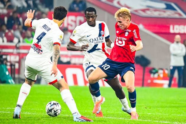 FOOTBALL : Lille OSC vs Paris SG - Ligue 1 - JournÃ e 7 - 05 10 2025 Hakon Arnar Haraldsson (Lille OSC) William Pacho (Paris SG) LilleFrance  Copyright: xBaptistexAutissierx