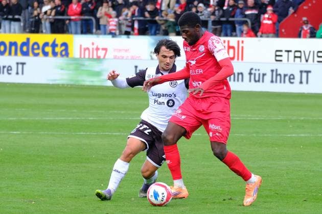 2025 - BRACK Super League- Fc Winterthur vs Lugano - Alexandre Jankewitz (red) and Martim Marques (white) Winterthur Schützenwiese Zürich Schweiz Copyright: xSergioxBrunettix