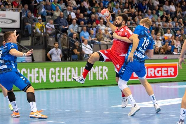 Handball I Men I Season 2025 2026 I Bundesliga I 7 Matchday I TVB Stuttgart MT Melsungen I 05 10 2025 Mohamed Amine Darmoul 71, MT Melsungen defended by Linus Schmid 18, TVB Stuttgart Stuttgart Porsche Arena Baden Württemberg Germany Copyright: xLobeca MaxxPetershansx