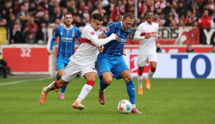 Stuttgart , Bundesliga Soccer VfB Stuttgart vs 1 FC Heidenheim, f l Badredine Bouanani VfB , Jonas Föhrenbach Heidenheim According to the regulations of the DFL German Soccer League, it is prohibited to use or have used photographs taken in the stadium and or of the match in the form of sequential images and or video-like photo series