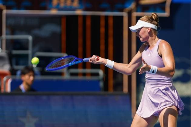 WUHAN, CHINA - OCTOBER 06: Ashlyn Krueger of the United States returns a shot in the Women s Singles Round of 64 match against Hailey Baptiste of the United States on day 3 of 2025 Wuhan Open at Optics Valley International Tennis Center on October 6, 2025 in Wuhan, Hubei Province of China.  Copyright: xVCGx 111595385756