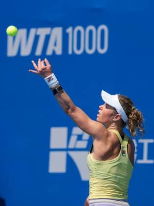 WUHAN, CHINA - OCTOBER 06: Laura Siegemund of Germany returns a shot in the Women s Singles Round of 64 match against Dayana Yastremska of Ukraine on day 3 of 2025 Wuhan Open at Optics Valley International Tennis Center on October 6, 2025 in Wuhan, Hubei Province of China.  Copyright: xVCGx 111595396584