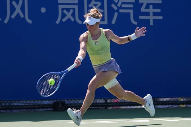 WUHAN, CHINA - OCTOBER 06: Laura Siegemund of Germany returns a shot in the Women s Singles Round of 64 match against Dayana Yastremska of Ukraine on day 3 of 2025 Wuhan Open at Optics Valley International Tennis Center on October 6, 2025 in Wuhan, Hubei Province of China.  Copyright: xVCGx 111595396577