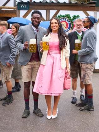 Alphonso Davies of Bayern München with girlfriend Sheyenne at the visit of the beer festival Oktoberfest of the football team FC BAYERN MÜNCHEN 1.German Football League on October 5, 2025 in Munich, Germany. Season 2025 2026, 1.Bundesliga, IMPORTANT: PUBLICATION ONLY IN GERMANY