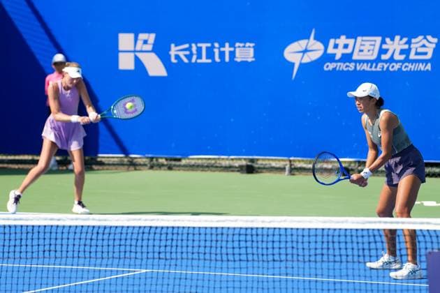 WUHAN, CHINA - OCTOBER 06: Zhang Shuai of China and Kristina Mladenovic of France return a shot in the Women s Doubles Round of 32 match against Shuko Aoyama of Japan and Cristina Bucsa of Spain on day 3 of 2025 Wuhan Open at Optics Valley International Tennis Center on October 6, 2025 in Wuhan, Hubei Province of China.  Copyright: xVCGx 111595399827