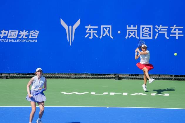 WUHAN, CHINA - OCTOBER 06: Shuko Aoyama of Japan and Cristina Bucsa of Spain return a shot in the Women s Doubles Round of 32 match against Zhang Shuai of China and Kristina Mladenovic of France on day 3 of 2025 Wuhan Open at Optics Valley International Tennis Center on October 6, 2025 in Wuhan, Hubei Province of China.  Copyright: xVCGx 111595399822