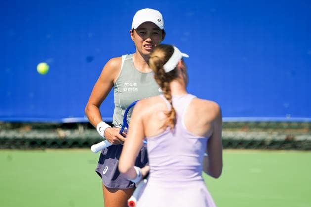 WUHAN, CHINA - OCTOBER 06: Zhang Shuai of China and Kristina Mladenovic of France react in the Women s Doubles Round of 32 match against Shuko Aoyama of Japan and Cristina Bucsa of Spain on day 3 of 2025 Wuhan Open at Optics Valley International Tennis Center on October 6, 2025 in Wuhan, Hubei Province of China.  Copyright: xVCGx 111595399809