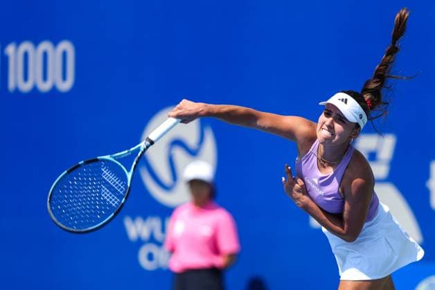 WUHAN, CHINA - OCTOBER 06: Camila Osorio of Colombia returns a shot in the Women s Singles Round of 64 match against Marie Bouzkova of Czech Republic on day 3 of 2025 Wuhan Open at Optics Valley International Tennis Center on October 6, 2025 in Wuhan, Hubei Province of China.  Copyright: xVCGx 111595402141