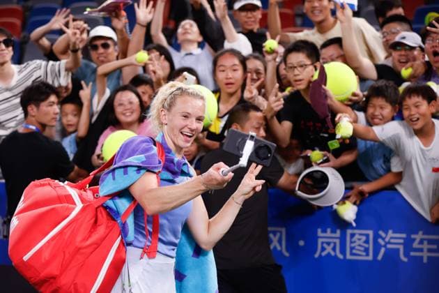 WUHAN, CHINA - OCTOBER 06: Katerina Siniakova of Czech Republic takes a selfie with fans after the Women s Singles Round of 64 match against Diana Shnaider on day 3 of 2025 Wuhan Open at Optics Valley International Tennis Center on October 6, 2025 in Wuhan, Hubei Province of China.  Copyright: xVCGx 111595400616