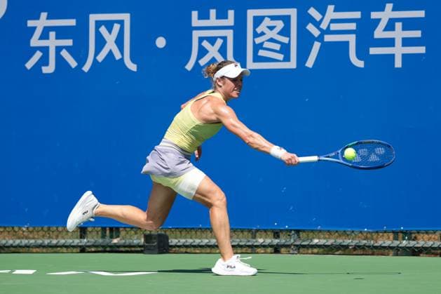 WUHAN, CHINA - OCTOBER 06: Laura Siegemund of Germany returns a shot in the Women s Singles Round of 64 match against Dayana Yastremska of Ukraine on day 3 of 2025 Wuhan Open at Optics Valley International Tennis Center on October 6, 2025 in Wuhan, Hubei Province of China.  Copyright: xVCGx 111595396564