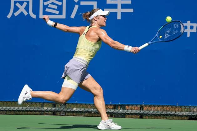 WUHAN, CHINA - OCTOBER 06: Laura Siegemund of Germany returns a shot in the Women s Singles Round of 64 match against Dayana Yastremska of Ukraine on day 3 of 2025 Wuhan Open at Optics Valley International Tennis Center on October 6, 2025 in Wuhan, Hubei Province of China.  Copyright: xVCGx 111595396606