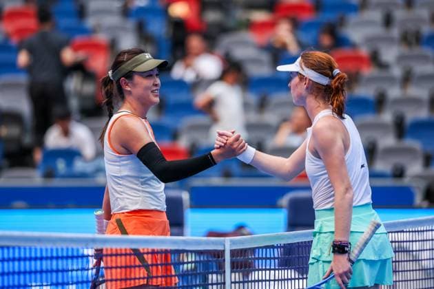 WUHAN, CHINA - OCTOBER 06: Maya Joint (R) of Australia shakes hands with Zhu Lin of China in the Women s Singles Round of 64 match on day 3 of 2025 Wuhan Open at Optics Valley International Tennis Center on October 6, 2025 in Wuhan, Hubei Province of China.  Copyright: xVCGx 111595410724
