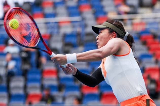 WUHAN, CHINA - OCTOBER 06: Zhu Lin of China returns a shot in the Women s Singles Round of 64 match against Maya Joint of Australia on day 3 of 2025 Wuhan Open at Optics Valley International Tennis Center on October 6, 2025 in Wuhan, Hubei Province of China.  Copyright: xVCGx 111595410717