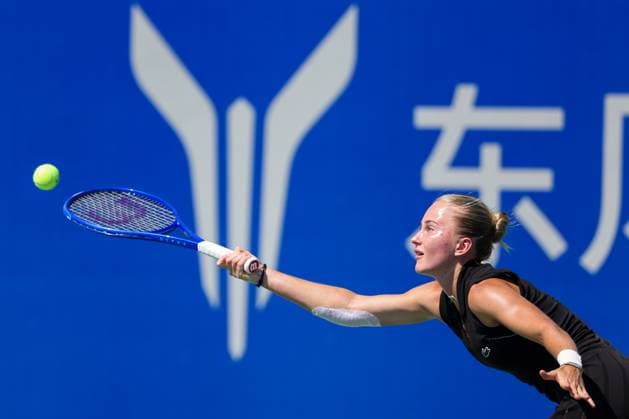 WUHAN, CHINA - OCTOBER 06: Polina Kudermetova returns a shot in the Women s Singles Round of 64 match against Elise Mertens of Belgium on day 3 of 2025 Wuhan Open at Optics Valley International Tennis Center on October 6, 2025 in Wuhan, Hubei Province of China.  Copyright: xVCGx 111595438275