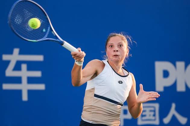 WUHAN, CHINA - OCTOBER 06: Antonia Ruzic of Croatia returns a shot in the Women s Singles Round of 64 match against Magda Linette of Poland on day 3 of 2025 Wuhan Open at Optics Valley International Tennis Center on October 6, 2025 in Wuhan, Hubei Province of China.  Copyright: xVCGx 111595440896
