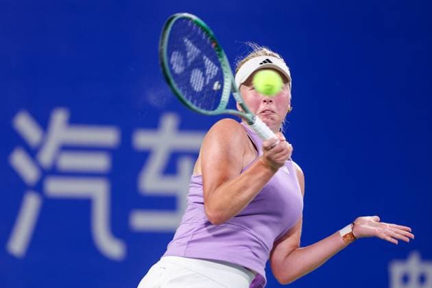WUHAN, CHINA - OCTOBER 06: Clara Tauson of Denmark returns a shot in the Women s Singles Round of 64 match against Olga Danilovic of Serbia on day 3 of 2025 Wuhan Open at Optics Valley International Tennis Center on October 6, 2025 in Wuhan, Hubei Province of China.  Copyright: xVCGx 111595443121