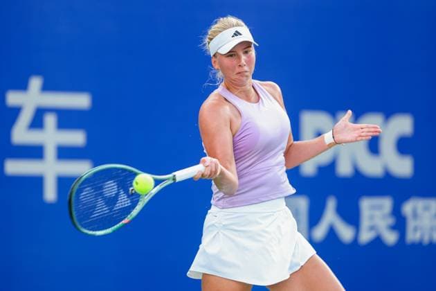WUHAN, CHINA - OCTOBER 06: Clara Tauson of Denmark returns a shot in the Women s Singles Round of 64 match against Olga Danilovic of Serbia on day 3 of 2025 Wuhan Open at Optics Valley International Tennis Center on October 6, 2025 in Wuhan, Hubei Province of China.  Copyright: xVCGx 111595443112