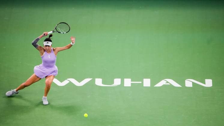 WUHAN, CHINA - OCTOBER 06: Wang Xinyu of China competes in the Women s Singles Round of 64 match against Moyuka Uchijima of Japan on day 3 of 2025 Wuhan Open at Optics Valley International Tennis Center on October 6, 2025 in Wuhan, Hubei Province of China.  Copyright: xVCGx 111595463976
