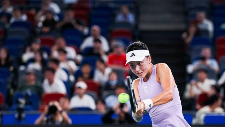 WUHAN, CHINA - OCTOBER 06: Wang Xinyu of China competes in the Women s Singles Round of 64 match against Moyuka Uchijima of Japan on day 3 of 2025 Wuhan Open at Optics Valley International Tennis Center on October 6, 2025 in Wuhan, Hubei Province of China.  Copyright: xVCGx 111595463951