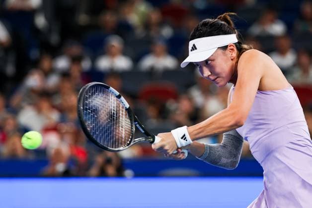 WUHAN, CHINA - OCTOBER 06: Wang Xinyu of China competes in the Women s Singles Round of 64 match against Moyuka Uchijima of Japan on day 3 of 2025 Wuhan Open at Optics Valley International Tennis Center on October 6, 2025 in Wuhan, Hubei Province of China.  Copyright: xVCGx 111595463945
