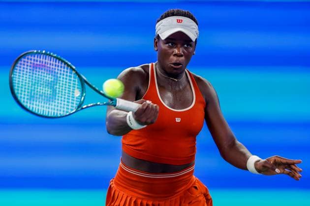 WUHAN, CHINA - OCTOBER 06: Victoria Mboko of Canada competes in the Women s Singles Round of 64 match against Ekaterina Alexandrova on day 3 of 2025 Wuhan Open at Optics Valley International Tennis Center on October 6, 2025 in Wuhan, Hubei Province of China.  Copyright: xVCGx 111595581612