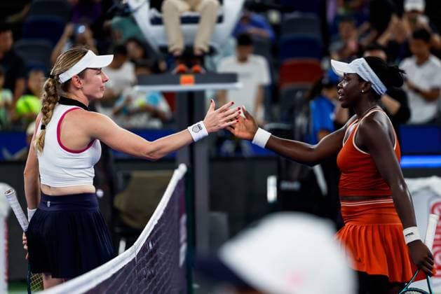 WUHAN, CHINA - OCTOBER 06: Ekaterina Alexandrova high-fives Victoria Mboko of Canada after the Women s Singles Round of 64 match on day 3 of 2025 Wuhan Open at Optics Valley International Tennis Center on October 6, 2025 in Wuhan, Hubei Province of China.  Copyright: xVCGx 111595581583