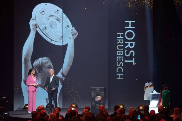Presenter Esther SEDLACZEK and award winner Horst HRUBESCH, HALL OF FAME Award Ceremony 2025 on 06 10 2025 at the German Football Museum in Dortmund Germany Â