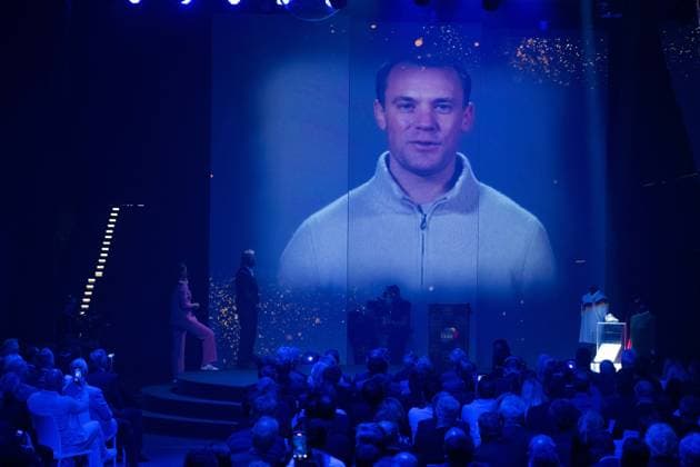 Moderator Esther SEDLACZEK and award winner Horst HRUBESCH, Manuel NEUER speaks a greeting message on the screen, HALL OF FAME Award Ceremony 2025 on 06 10 2025 at the German Football Museum in Dortmund Germany Â