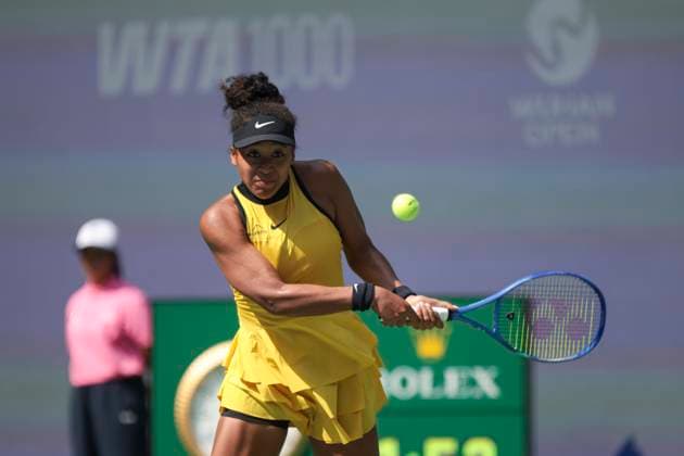 WUHAN, CHINA - OCTOBER 07: Naomi Osaka of Japan returns a shot in the Women s Singles Round of 64 match against Leylah Fernandez of Canada on day 4 of 2025 Wuhan Open at Optics Valley International Tennis Center on October 7, 2025 in Wuhan, Hubei Province of China.  Copyright: xVCGx 111595619671