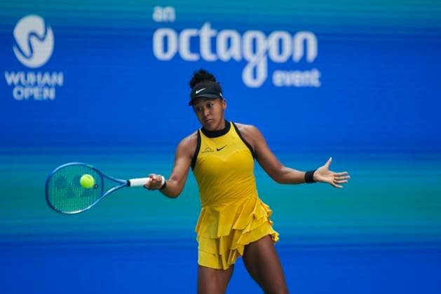 WUHAN, CHINA - OCTOBER 07: Naomi Osaka of Japan returns a shot in the Women s Singles Round of 64 match against Leylah Fernandez of Canada on day 4 of 2025 Wuhan Open at Optics Valley International Tennis Center on October 7, 2025 in Wuhan, Hubei Province of China.  Copyright: xVCGx 111595619653