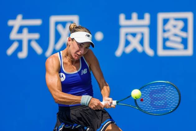 WUHAN, CHINA - OCTOBER 07: McCartney Kessler of the United States returns a shot in the Women s Singles Round of 64 match against Jaqueline Cristian of Romania on day 4 of 2025 Wuhan Open at Optics Valley International Tennis Center on October 7, 2025 in Wuhan, Hubei Province of China.  Copyright: xVCGx 111595621804