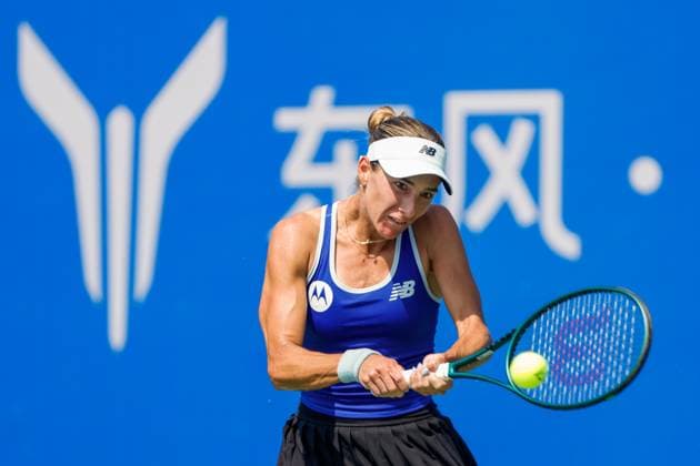 WUHAN, CHINA - OCTOBER 07: McCartney Kessler of the United States returns a shot in the Women s Singles Round of 64 match against Jaqueline Cristian of Romania on day 4 of 2025 Wuhan Open at Optics Valley International Tennis Center on October 7, 2025 in Wuhan, Hubei Province of China.  Copyright: xVCGx 111595621803