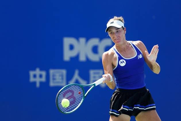 WUHAN, CHINA - OCTOBER 07: McCartney Kessler of the United States returns a shot in the Women s Singles Round of 64 match against Jaqueline Cristian of Romania on day 4 of 2025 Wuhan Open at Optics Valley International Tennis Center on October 7, 2025 in Wuhan, Hubei Province of China.  Copyright: xVCGx 111595621788