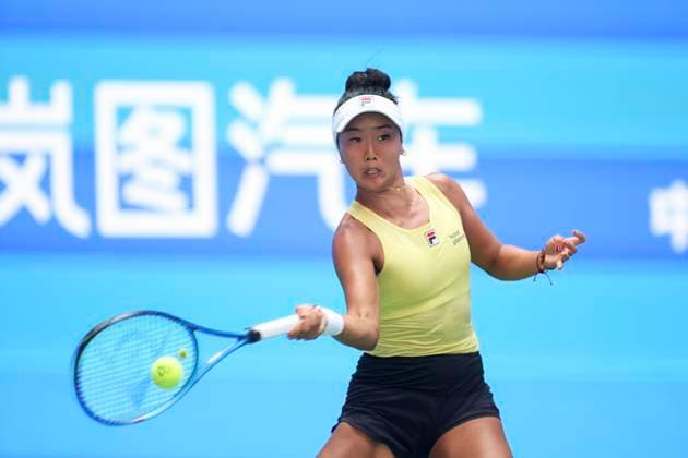 WUHAN, CHINA - OCTOBER 07: Ann Li of United States returns a shot in the Women s Singles Round of 64 match against Emma Raducanu of Great Britain on day 4 of 2025 Wuhan Open at Optics Valley International Tennis Center on October 7, 2025 in Wuhan, Hubei Province of China.  Copyright: xVCGx 111595637007