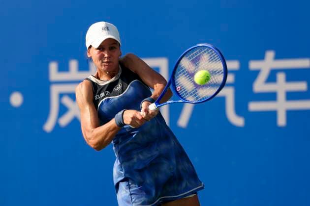 WUHAN, CHINA - OCTOBER 07: Veronika Kudermetova returns a shot in the Women s Singles Round of 64 match against Magdalena Frech of Poland on day 4 of 2025 Wuhan Open at Optics Valley International Tennis Center on October 7, 2025 in Wuhan, Hubei Province of China.  Copyright: xVCGx 111595660366