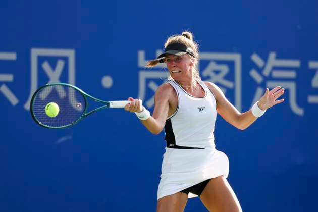 WUHAN, CHINA - OCTOBER 07: Magdalena Frech of Poland returns a shot in the Women s Singles Round of 64 match against Veronika Kudermetova on day 4 of 2025 Wuhan Open at Optics Valley International Tennis Center on October 7, 2025 in Wuhan, Hubei Province of China.  Copyright: xVCGx 111595660374
