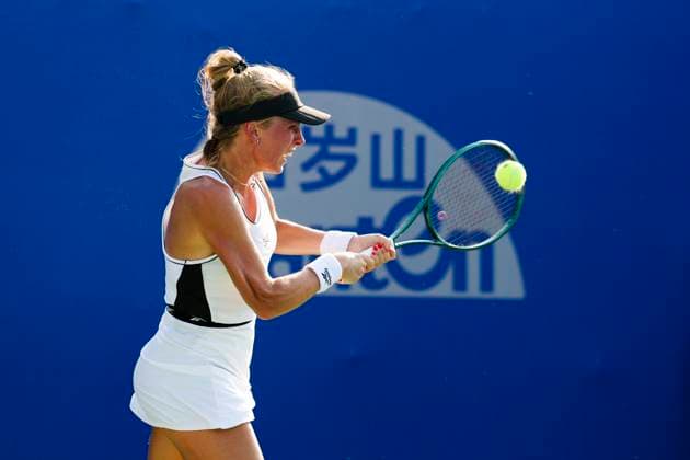 WUHAN, CHINA - OCTOBER 07: Magdalena Frech of Poland returns a shot in the Women s Singles Round of 64 match against Veronika Kudermetova on day 4 of 2025 Wuhan Open at Optics Valley International Tennis Center on October 7, 2025 in Wuhan, Hubei Province of China.  Copyright: xVCGx 111595660379