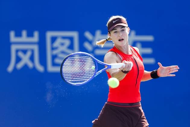 WUHAN, CHINA - OCTOBER 07: Anna Kalinskaya returns a shot in the Women s Singles Round of 64 match against Rebecca Sramkova of Slovakia on day 4 of 2025 Wuhan Open at Optics Valley International Tennis Center on October 7, 2025 in Wuhan, Hubei Province of China.  Copyright: xVCGx 111595667393