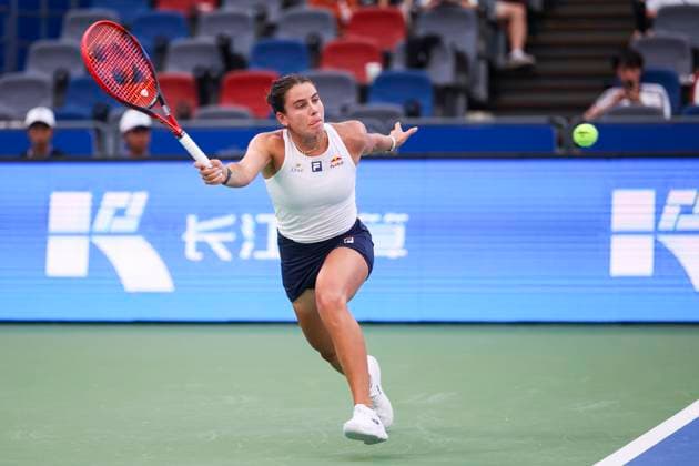 WUHAN, CHINA - OCTOBER 07: Emma Navarro of the United States returns a shot in the Women s Singles Round of 64 match against Zhang Shuai of China on day 4 of 2025 Wuhan Open at Optics Valley International Tennis Center on October 7, 2025 in Wuhan, Hubei Province of China.  Copyright: xVCGx 111595682048